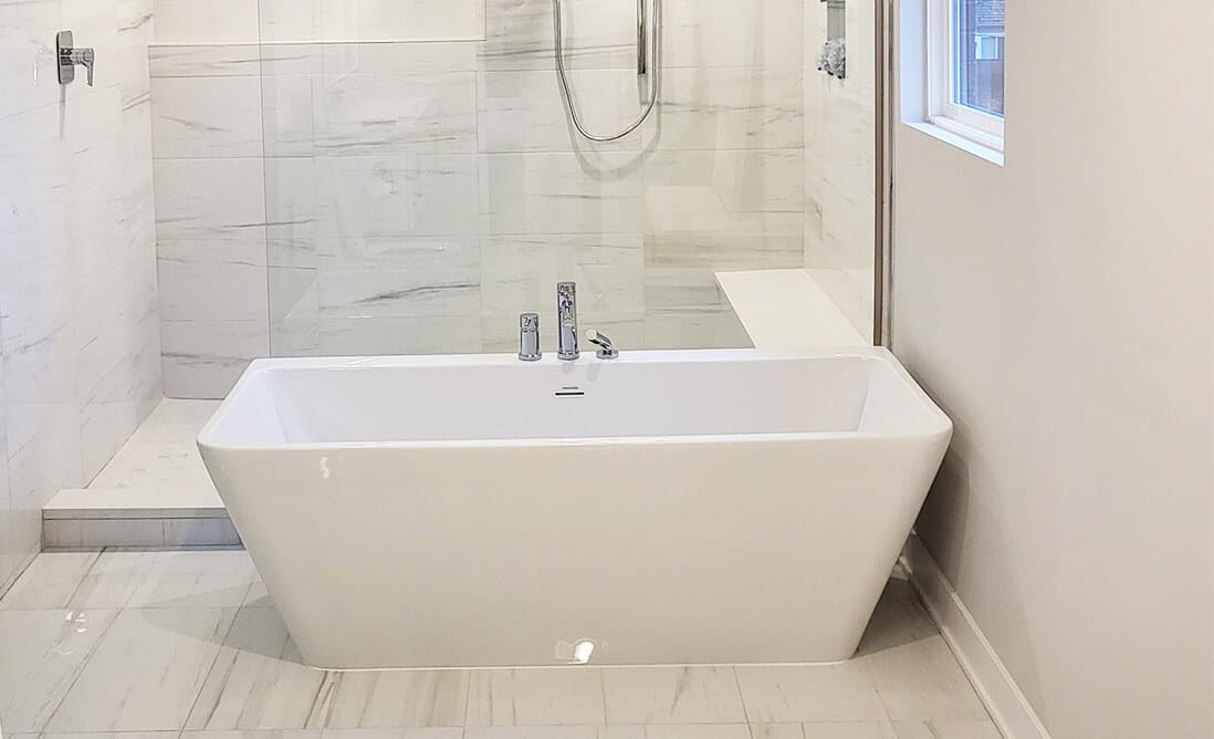 Indianapolis Best Bathroom Remodeling Company - European bathroom - soaking tub and custom floor to ceiling tiled shower with glass doors