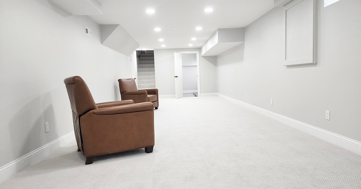Meridian Hills (Indianapolis) Basement finish - common area with carpet and grey walls